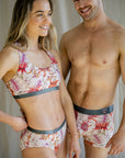 Stylish botanical-themed bamboo underwear in nude with pink, red, green, white, and orange flowers