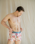Men's bamboo underwear with a botanical print featuring Waratah, Desert Pea, and Wax Flower