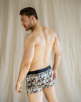 Eco-friendly boxer briefs featuring a leafy Spotted Gum pattern on a green base