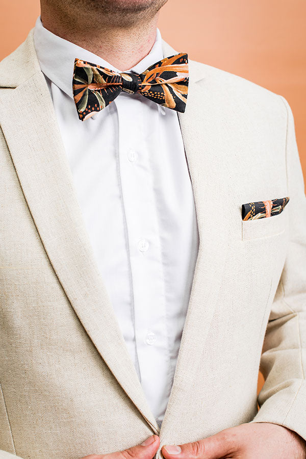 Modern and stylish bow tie featuring a detailed grass tree print in black, inspired by Australian native flora with intricate green and white patterns for a sophisticated look