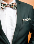 Stylish 100% cotton pocket square with a classic green background and white protea patterns, designed to elevate any suit