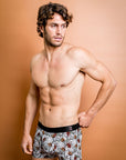 Eco-friendly bamboo boxer briefs featuring Australian Banksia design on a grey background