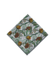 Men's grey pocket square with green, white, and pastel yellow Banksia design for weddings and formal events