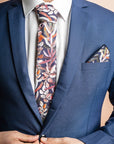 Elegant navy pocket square adorned with a white and pink protea floral design, perfect for adding a sophisticated botanical touch to formal wear