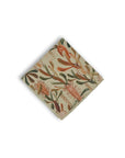 Artistic pocket square depicting the ancient and hardy Australian grass tree, rendered in warm, natural colors against a nude base, ideal for enhancing any suit