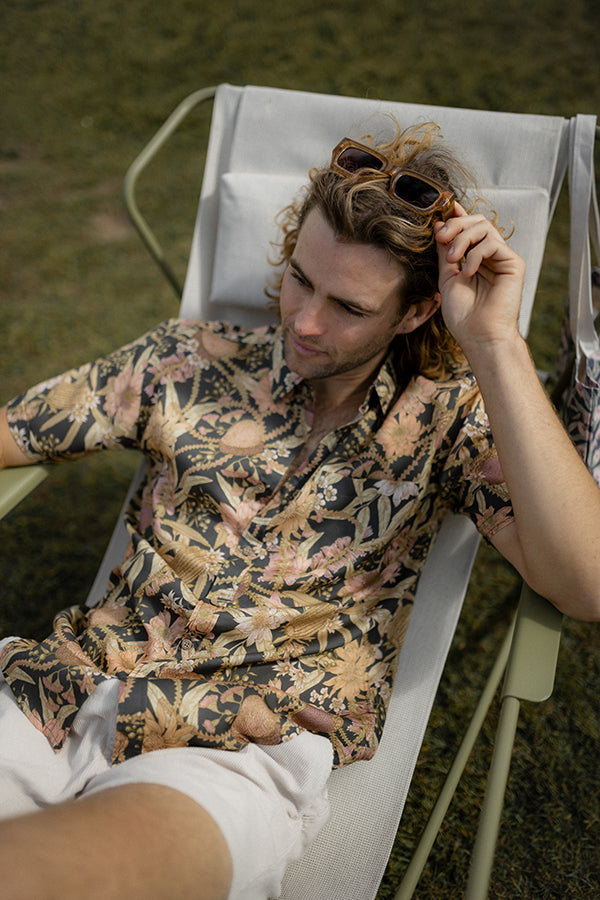 Relaxed fit Byron Banksia shirt showcasing detailed prints of native Australian plants and flowers, ideal for stylish, eco-conscious consumers
