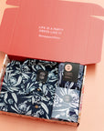 Premium men's gift set featuring shirt, underwear, and socks packed in a recycled gift box