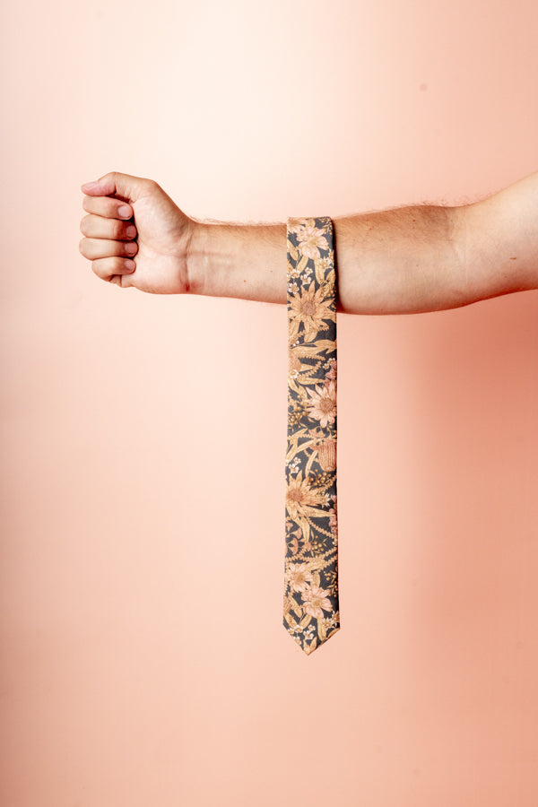 100% cotton tie showcasing a beautiful range of natives like Banksia and Waratah, ideal for special events and everyday elegance