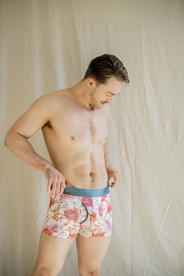 Men's bamboo underwear with a botanical print featuring Waratah, Desert Pea, and Wax Flower