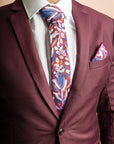 Stylish cotton tie showcasing a vibrant protea design in burgundy, ideal for formal occasions and nature lovers