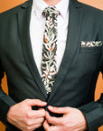 Stylish cotton tie showcasing a vibrant protea design in green, ideal for formal occasions and nature lovers