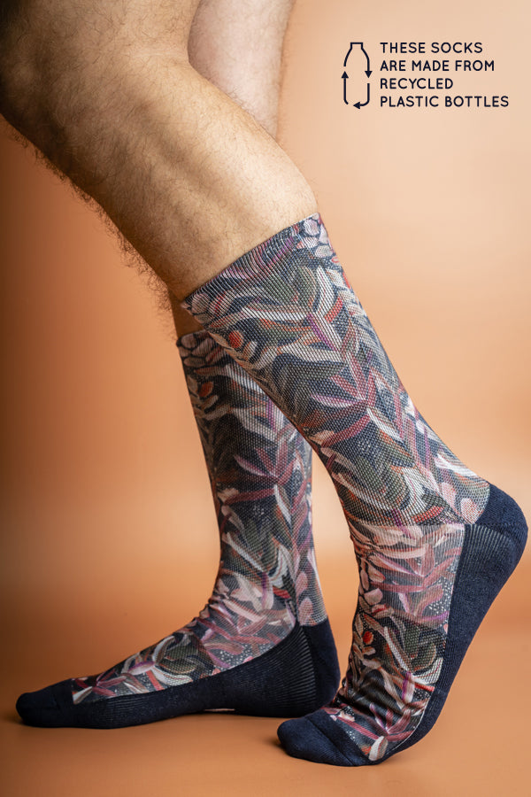 Soft and durable navy socks crafted from recycled bottles, decorated with a floral Protea pattern, ideal for fashion-conscious eco-warriors