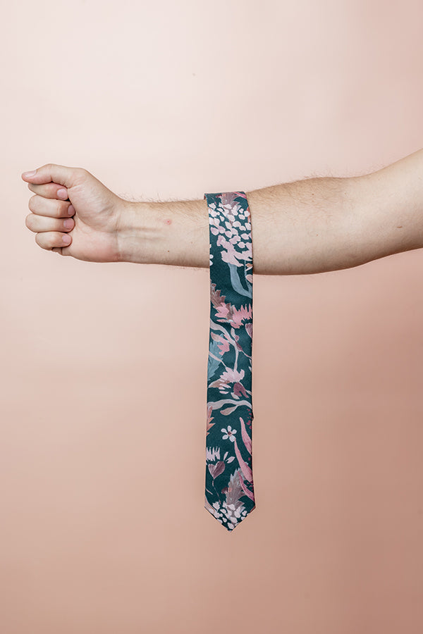 Elegant men's tie with a vibrant botanical design, perfect for adding a touch of nature-inspired elegance to formal attire